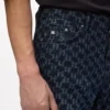 Džíny s celoplošným monogramem