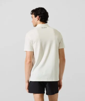 Polo tričko s monogramovou sponou Polo tričko s monogramovou sponou