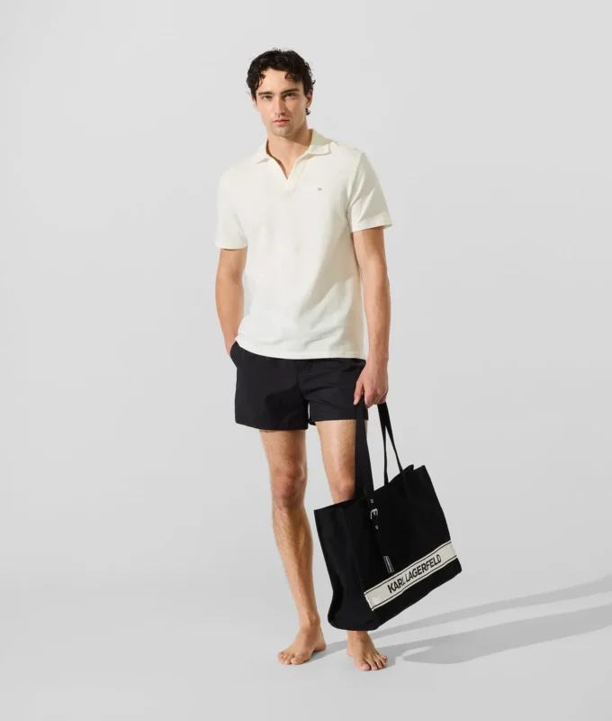 Polo tričko s monogramovou sponou Polo tričko s monogramovou sponou