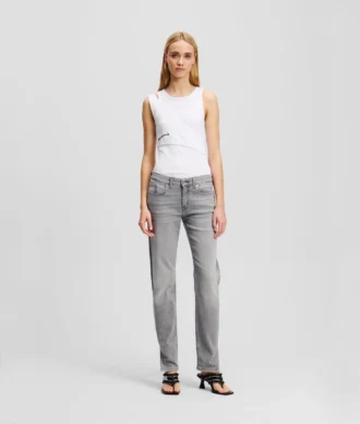 SLIM JEANS S STŘEDNÍM PASEM A ROZSTŘÍHNUTÝM LEMEM